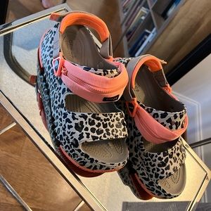 Crocs platform festival cheetah print sandals with secret zipper pouch